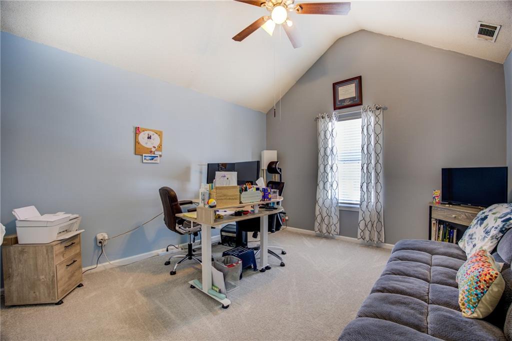 4885 Hidden Creek Place Decatur, GA 30035 - Photo 32 of 52 a workspace with furniture and a window