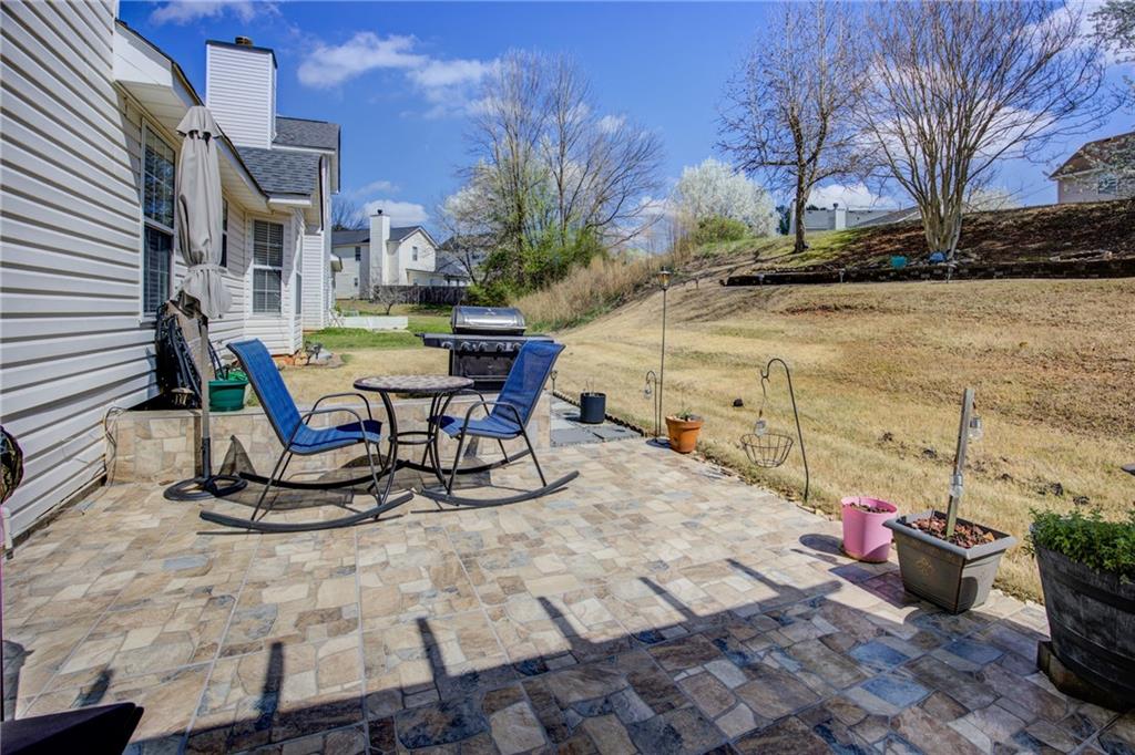 4885 Hidden Creek Place Decatur, GA 30035 - Photo 40 of 52 a view of a backyard with sitting area