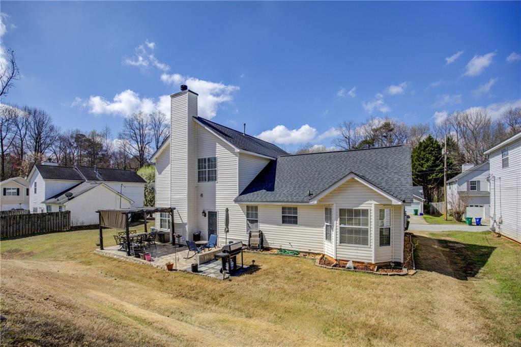 4885 Hidden Creek Place Decatur, GA 30035 - Photo 43 of 52 a view of a house with outdoor space and sitting area