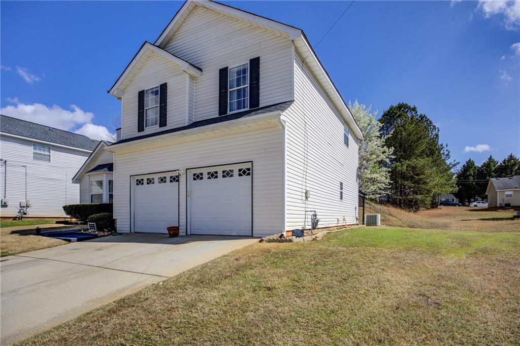 4885 Hidden Creek Place Decatur, GA 30035 - Photo 44 of 52 a front view of a house with a yard