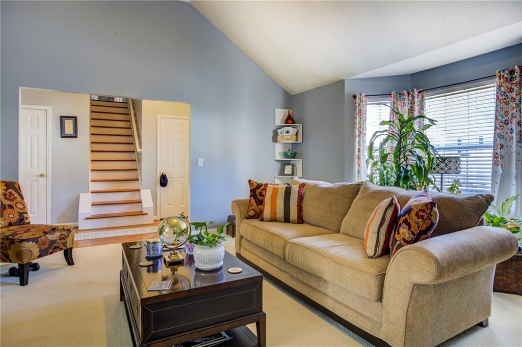 4885 Hidden Creek Place Decatur, GA 30035 - Photo 7 of 52 a living room with furniture and a large window