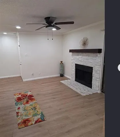 a room with furniture and a fireplace