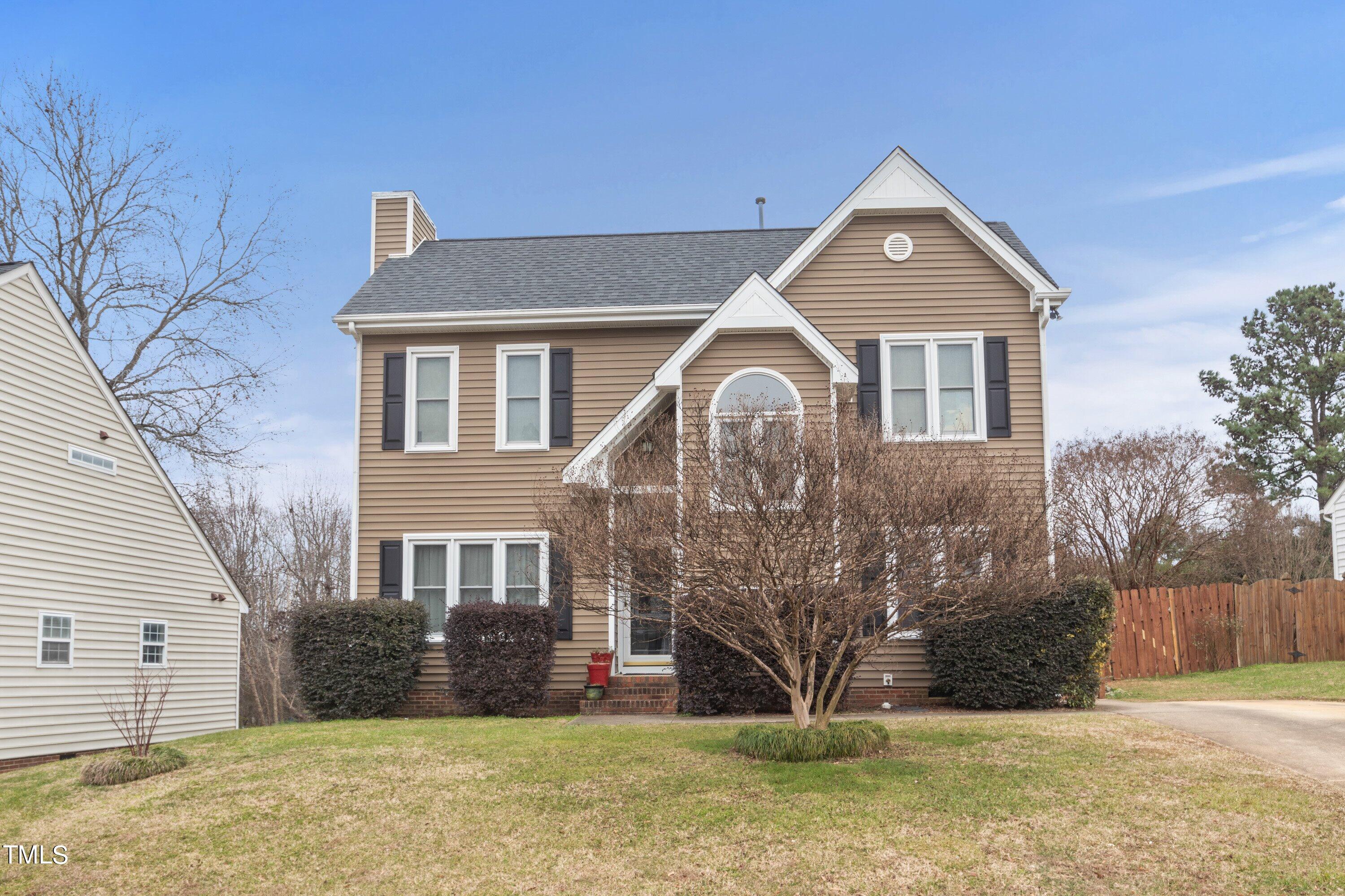 9421 Dawnshire Road Raleigh, NC 27615 - Photo 1 of 32 a front view of a house with a yard
