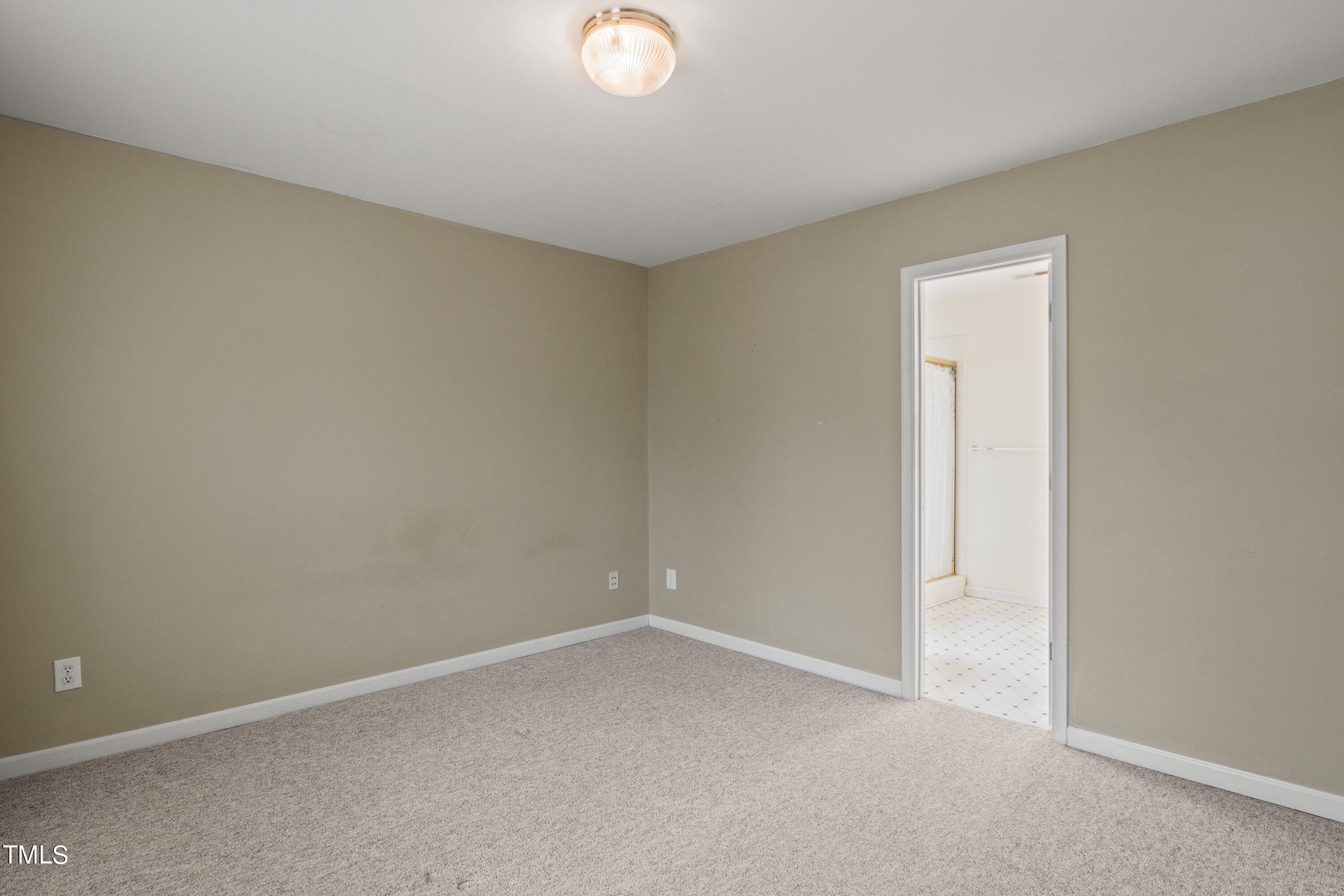 9421 Dawnshire Road Raleigh, NC 27615 - Photo 22 of 32 a view of an empty room