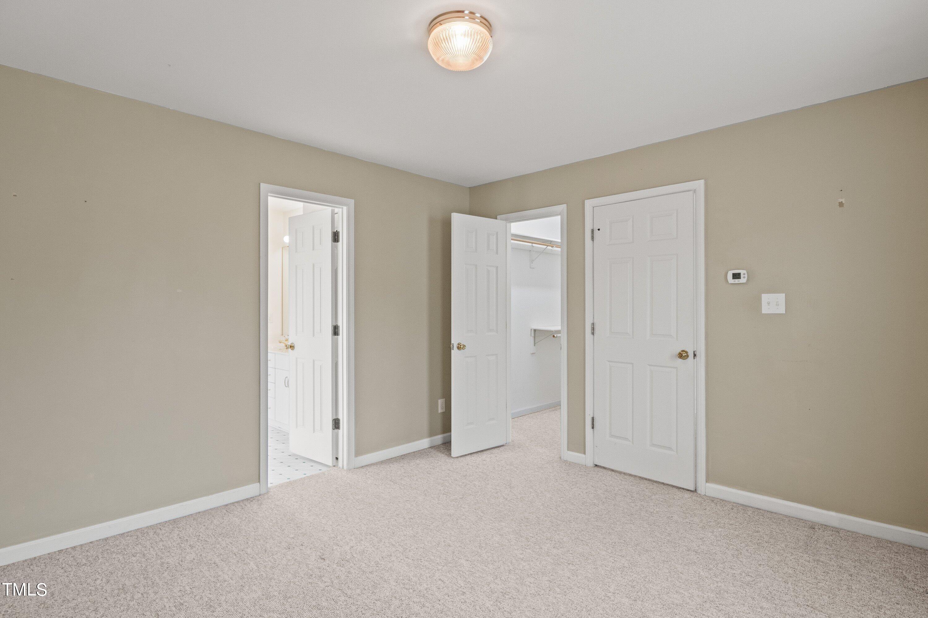 9421 Dawnshire Road Raleigh, NC 27615 - Photo 23 of 32 a view of an empty room and window