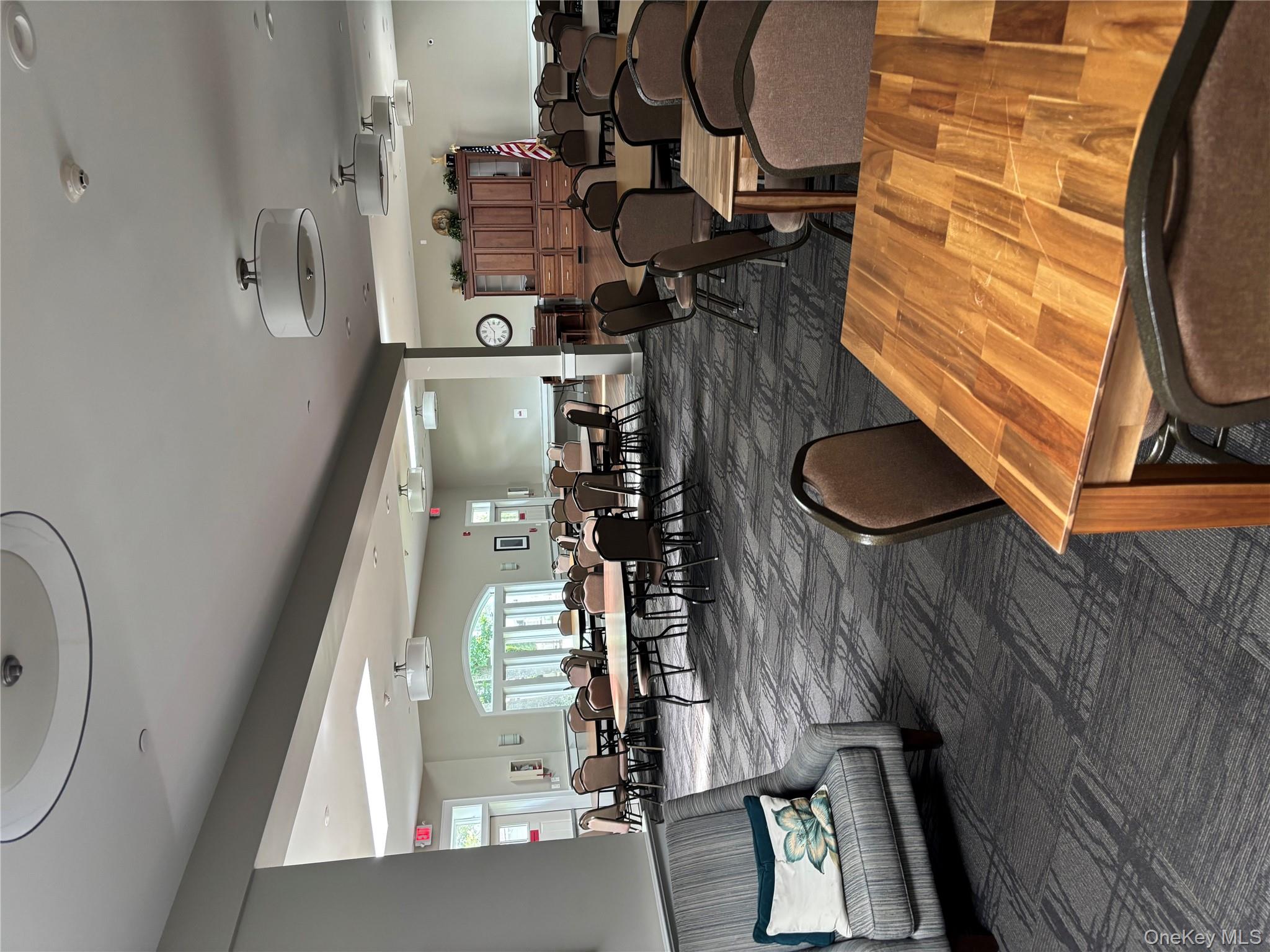 1661 Old Country Road, Unit 543 Riverhead, NY 11901 - Photo 23 of 26 View of carpeted dining area