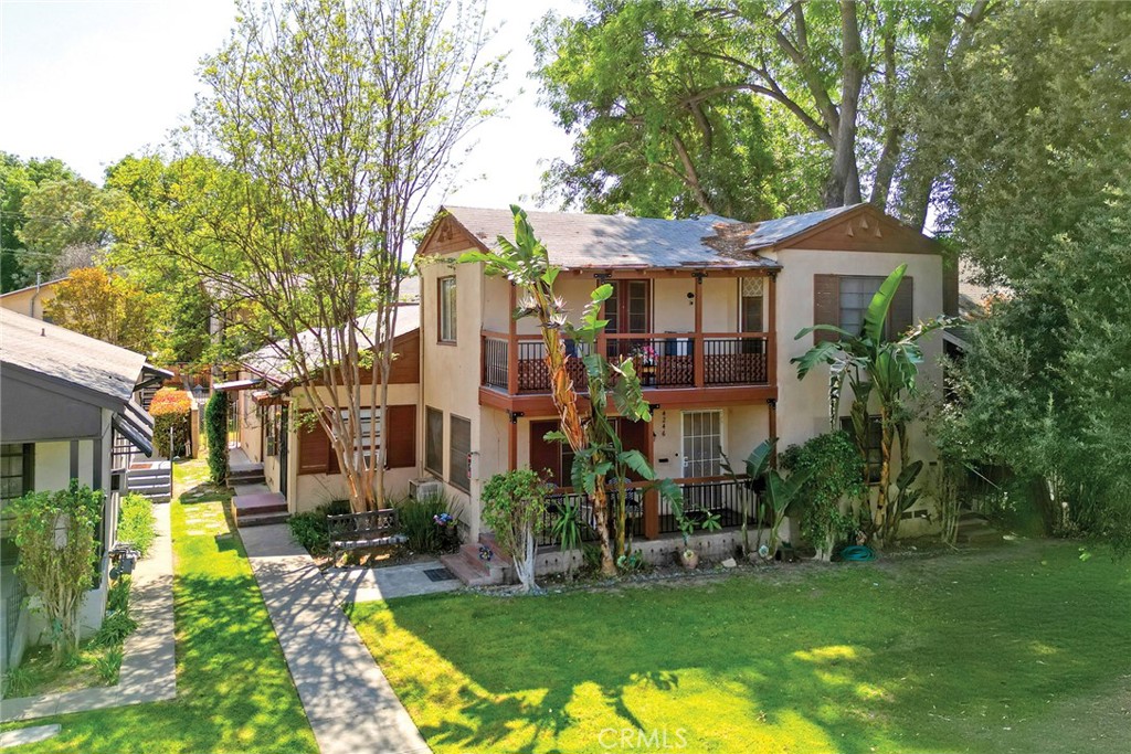 4250 Tenth Street Riverside, CA 92501 - Photo 1 of 1 a front view of a house with a yard
