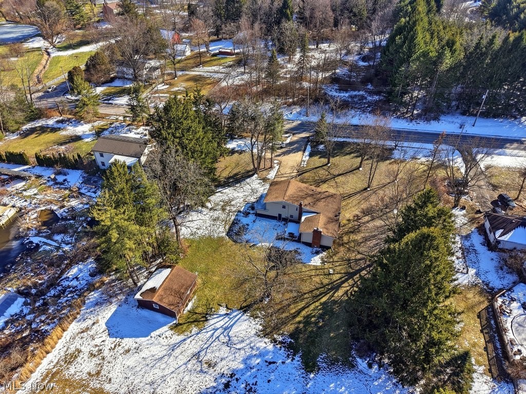 4699 West Bath Road Akron, OH 44333 - Photo 39 of 50 Snowy aerial view with view of scattered trees