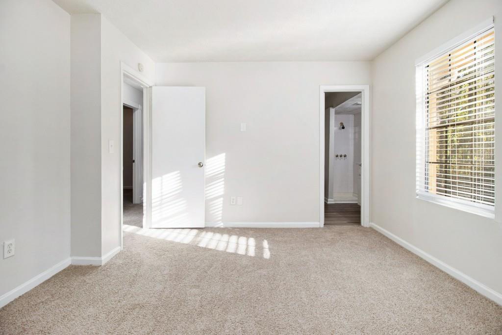 5774 Taffeta Court Lithonia, GA 30058 - Photo 12 of 25 a view of a livingroom with a window