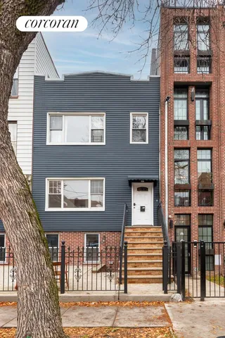 a front view of a building with glass windows
