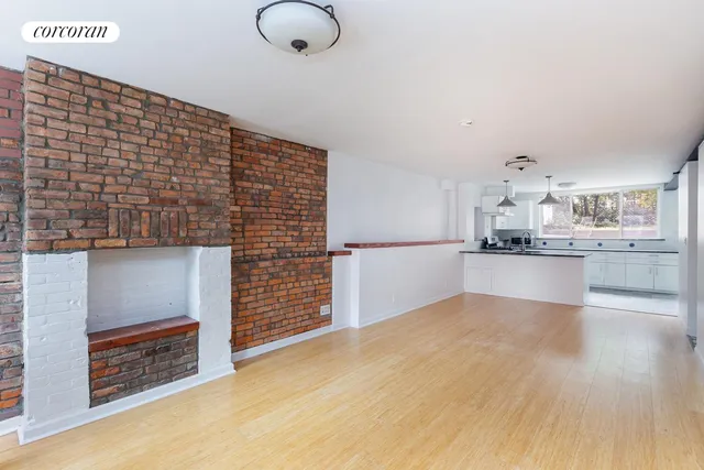 a view of kitchen and kitchen with furniture