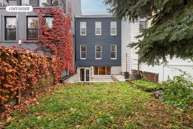 front view of a house with a small yard