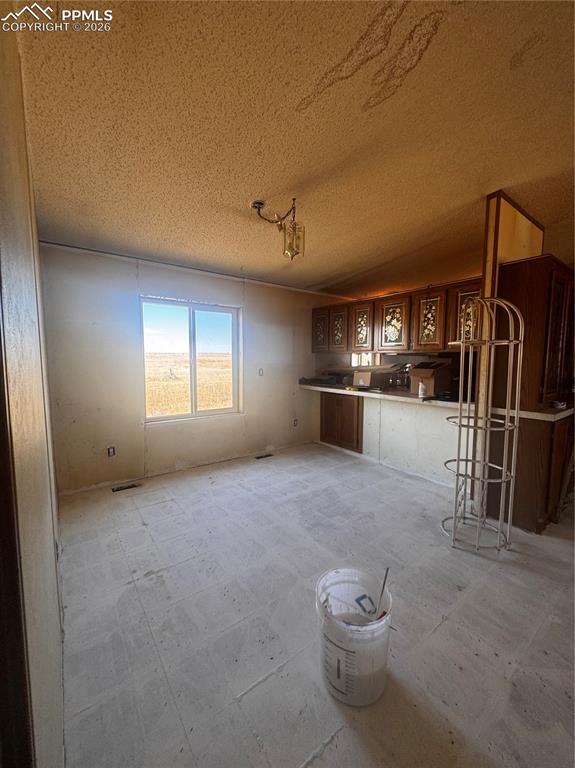 4150 Sengbeil Road Yoder, CO 80864 - Photo 2 of 9 a view of a livingroom with furniture and windows