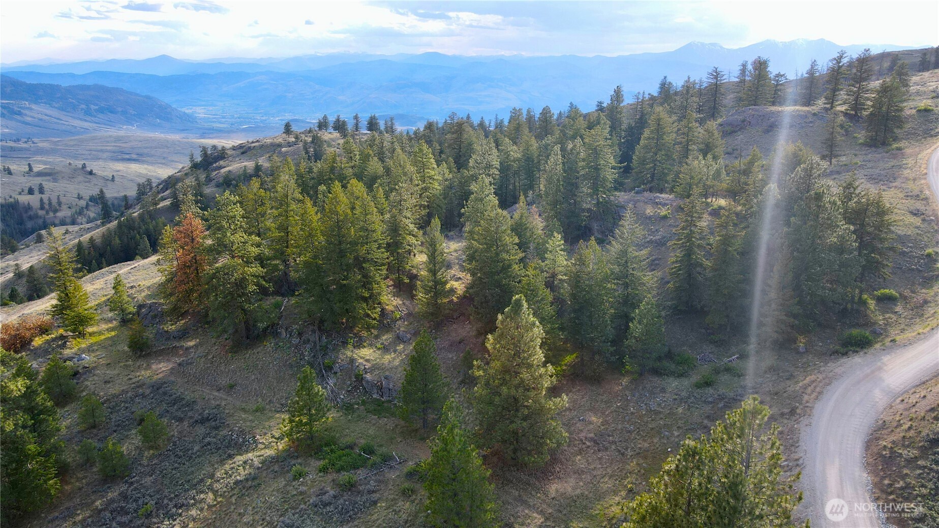 -tbd Blue Grouse Road Oroville, WA 98844 - Photo 21 of 31 a view of a city with lots of trees