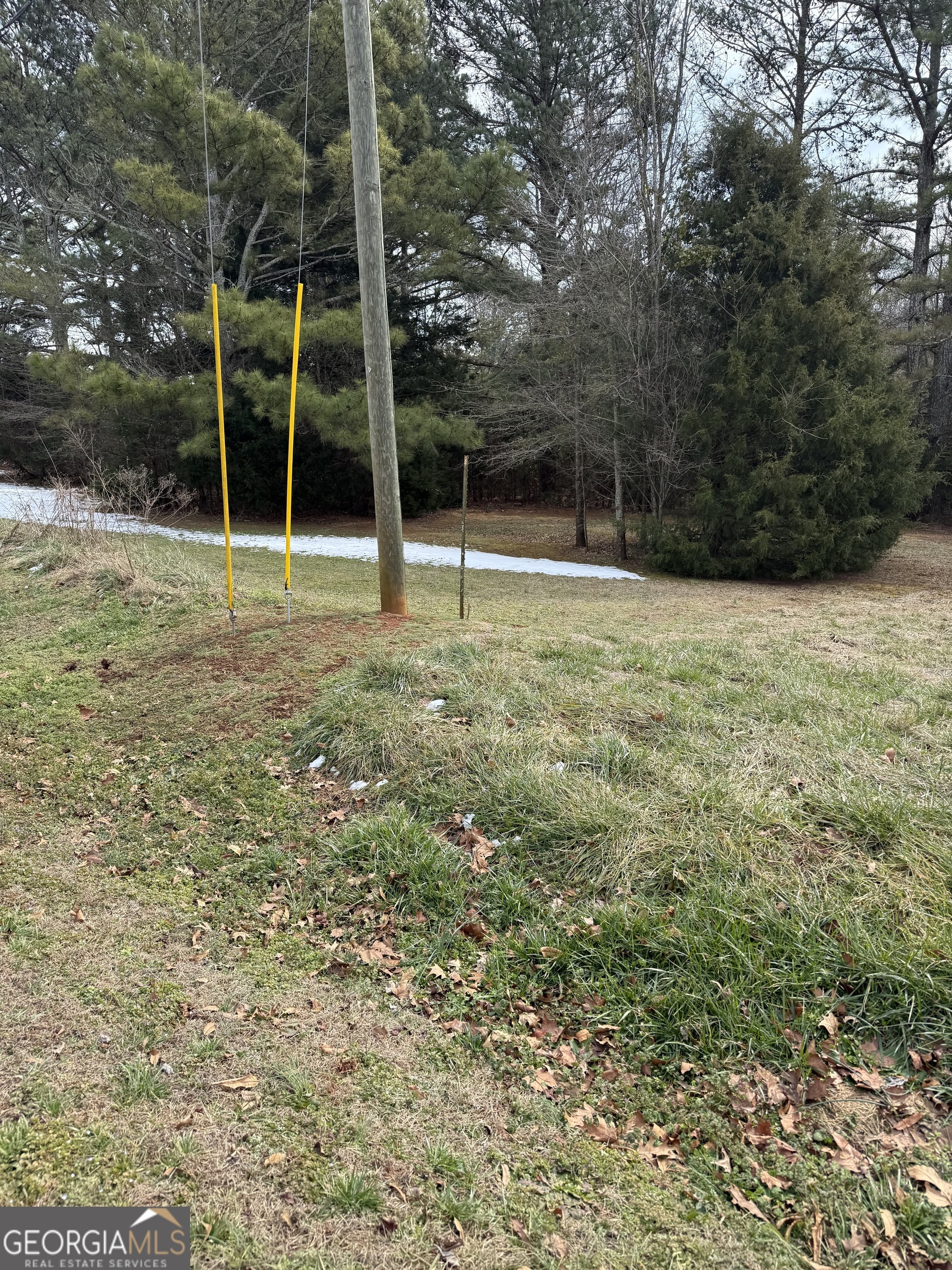 805 Tarpkins Road Commerce, GA 30530 - Photo 3 of 3 a view of a room with basketball court