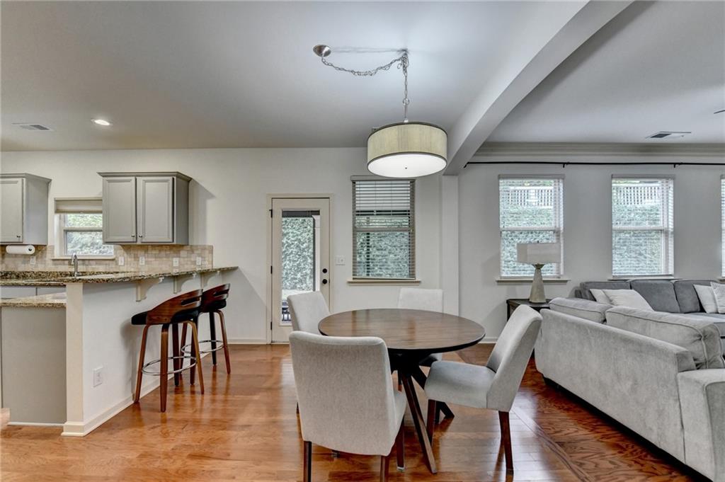 5013 Groover Drive Smyrna, GA 30080 - Photo 12 of 70 a view of a dining room with furniture window and wooden floor