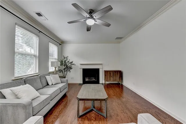 a bathroom with a sink mirror and toilet