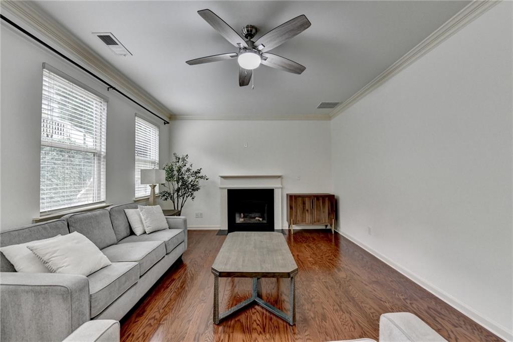 5013 Groover Drive Smyrna, GA 30080 - Photo 27 of 70 a living room with furniture and a fireplace