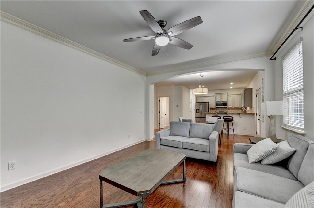 5013 Groover Drive Smyrna, GA 30080 - Photo 32 of 70 a living room with furniture and a wooden floor