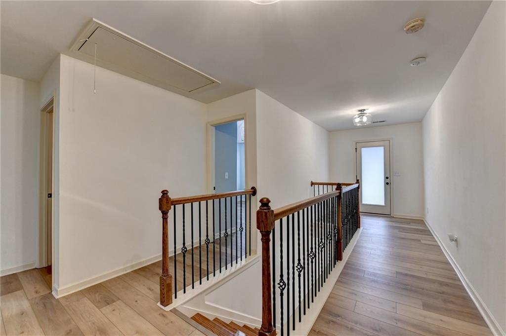 5013 Groover Drive Smyrna, GA 30080 - Photo 36 of 70 a view of a hallway with wooden floor and door