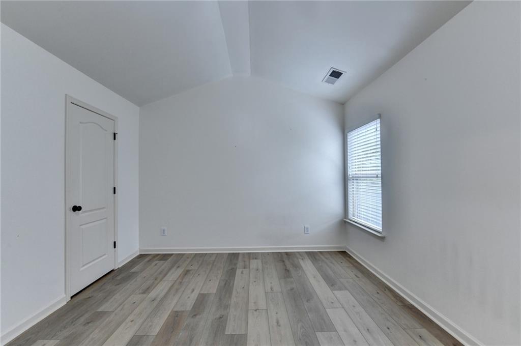 5013 Groover Drive Smyrna, GA 30080 - Photo 37 of 70 a view of an empty room and window