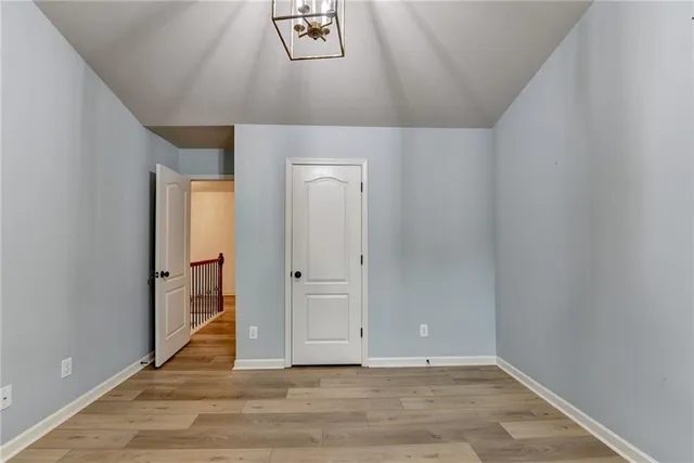 a view of a house with backyard and porch