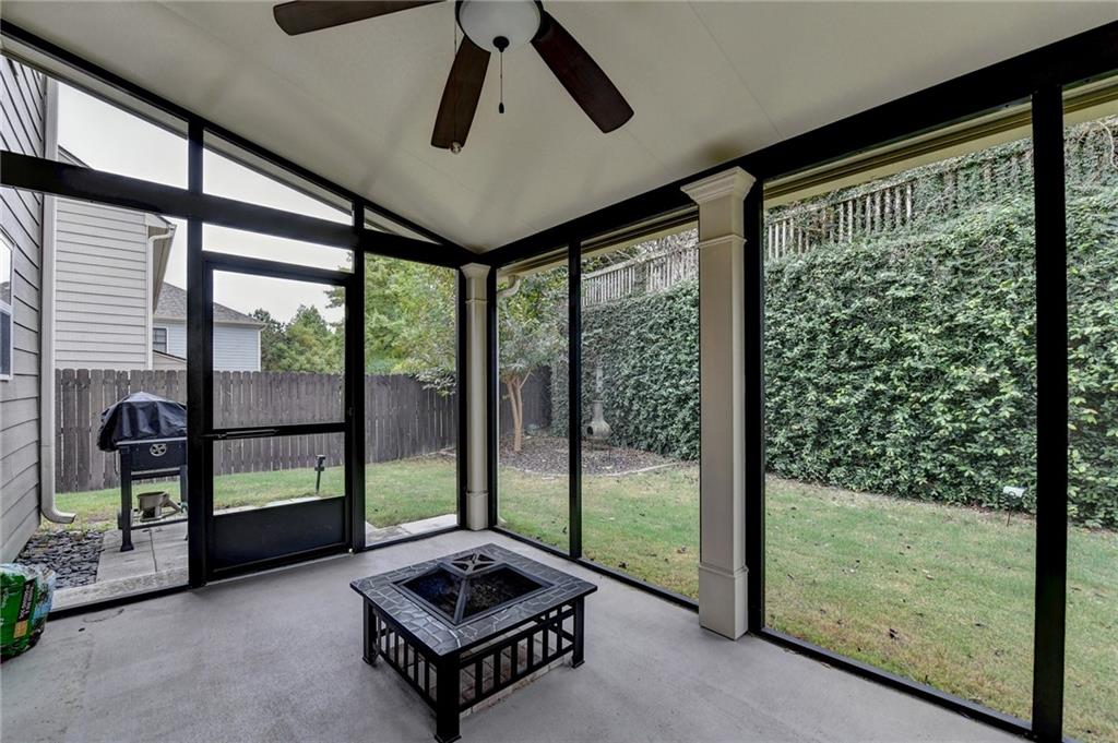 5013 Groover Drive Smyrna, GA 30080 - Photo 64 of 70 a living room with hardwood floor and sliding glass door