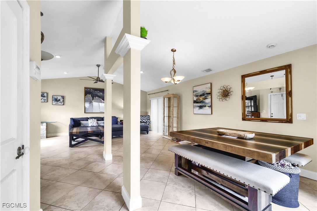 9141 Southwest 22nd Street, Unit F Boca Raton, FL 33428 - Photo 11 of 30 a living room with furniture and a table