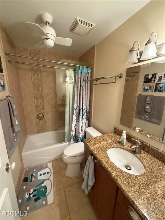 9141 Southwest 22nd Street Boca Raton, FL 33428 - Photo 11 of 14 a bathroom with a granite countertop sink toilet and shower