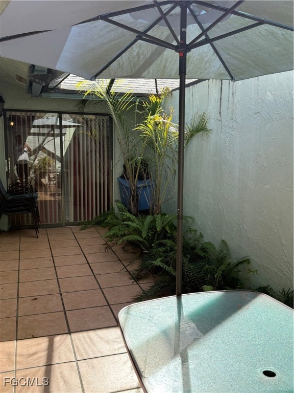 9141 Southwest 22nd Street Boca Raton, FL 33428 - Photo 14 of 14 a view of entryway with a glass door