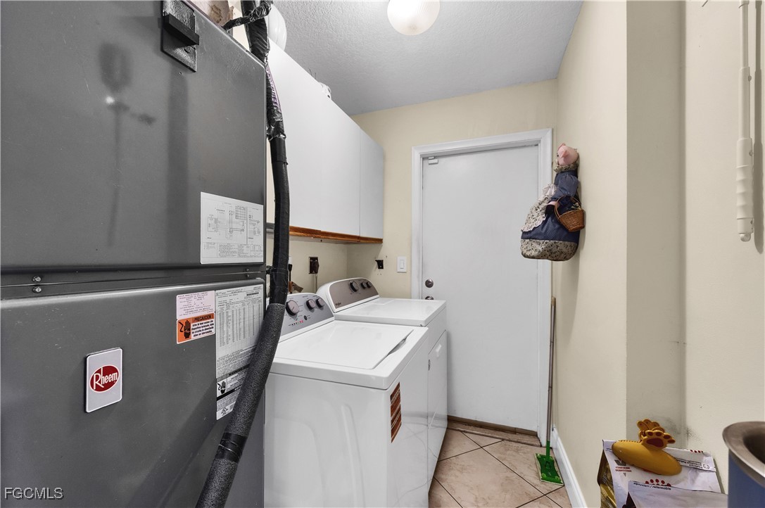 9141 Southwest 22nd Street, Unit F Boca Raton, FL 33428 - Photo 27 of 30 a utility room with dryer and washer