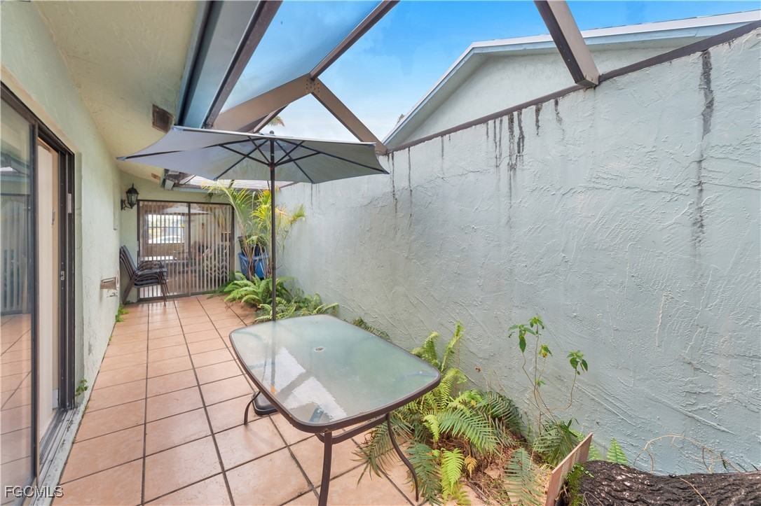 9141 Southwest 22nd Street, Unit F Boca Raton, FL 33428 - Photo 29 of 30 a view of an outdoor space