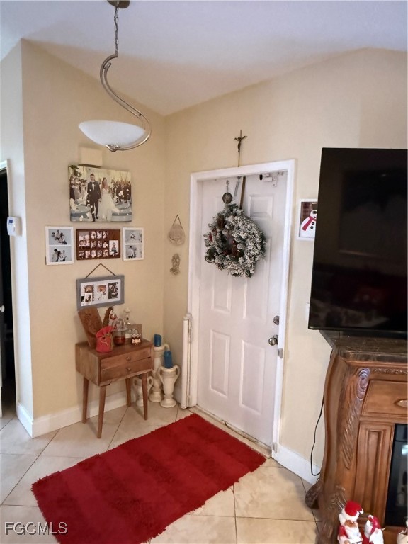 9141 Southwest 22nd Street Boca Raton, FL 33428 - Photo 5 of 14 a living room with furniture and a flat screen tv