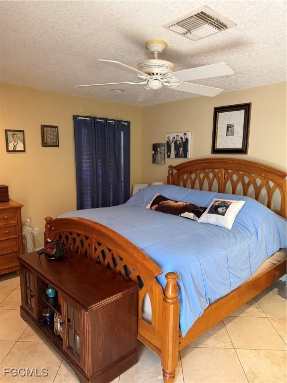 9141 Southwest 22nd Street Boca Raton, FL 33428 - Photo 9 of 14 a bedroom with a bed and wooden floor