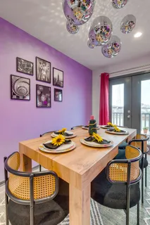 a table room with a table and chairs