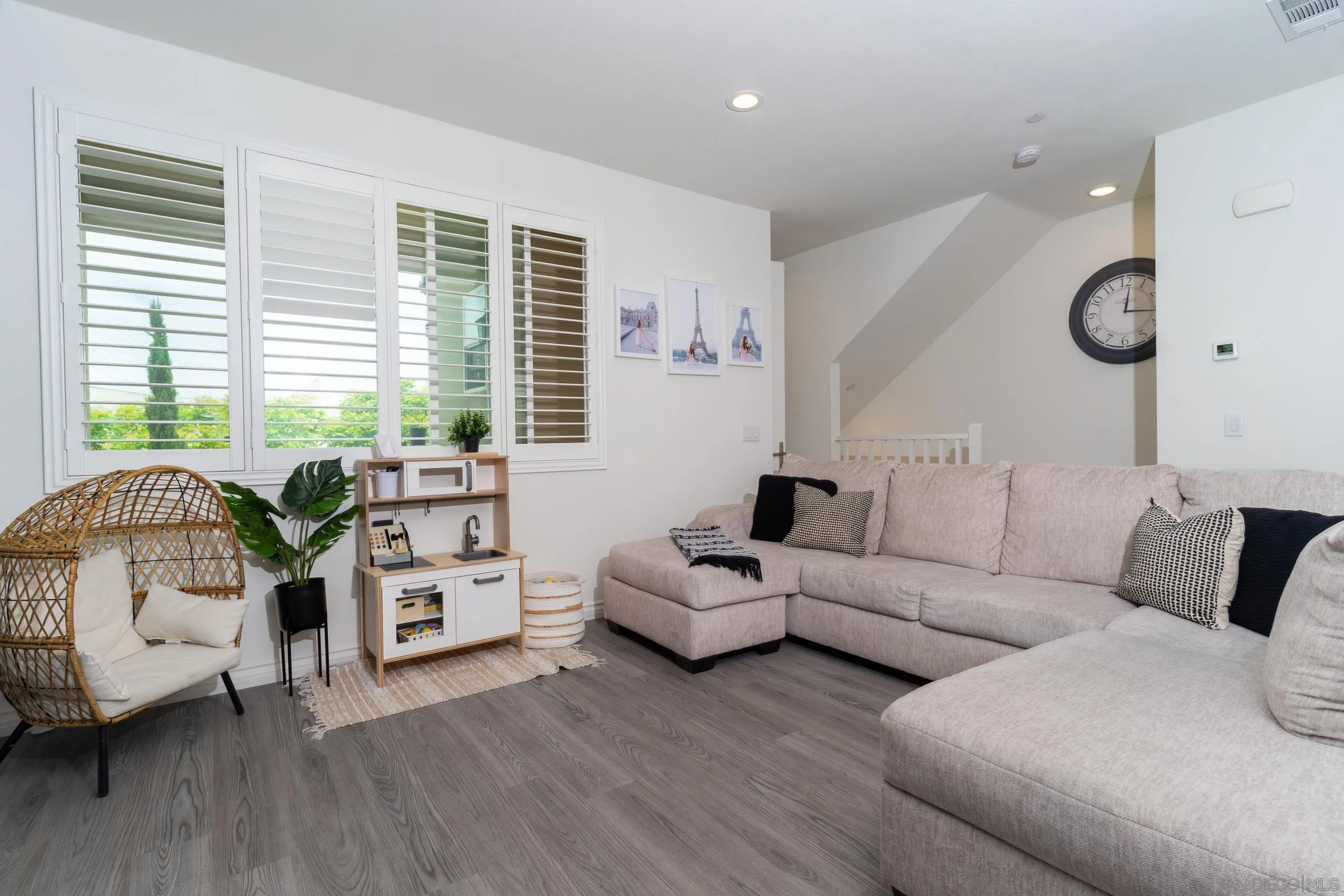 1380 Santa Victoria Road, Unit 2 Chula Vista, CA 91913 - Photo 11 of 27 a living room with furniture and a large window