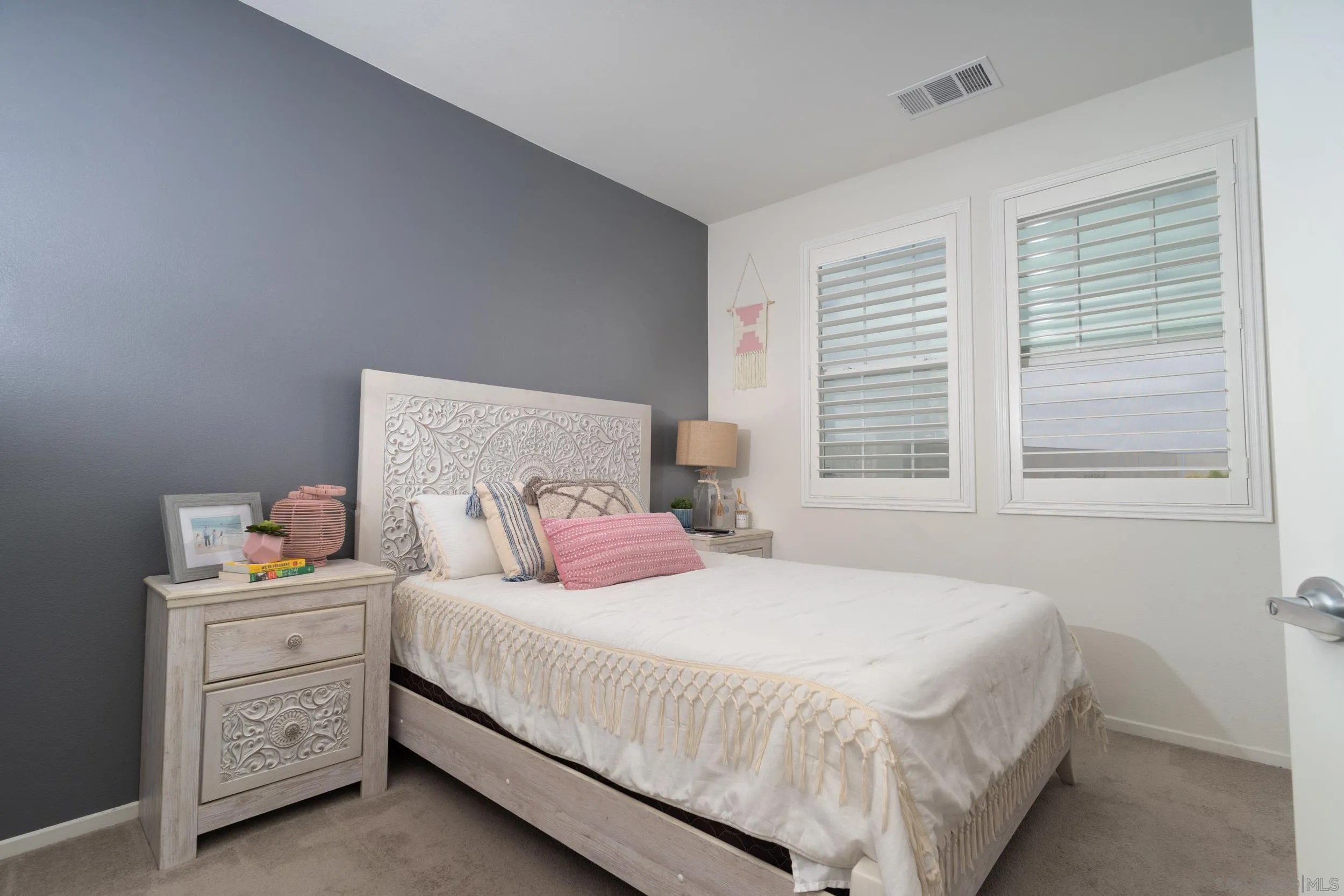 1380 Santa Victoria Road, Unit 2 Chula Vista, CA 91913 - Photo 13 of 27 a bedroom with a bed and a window