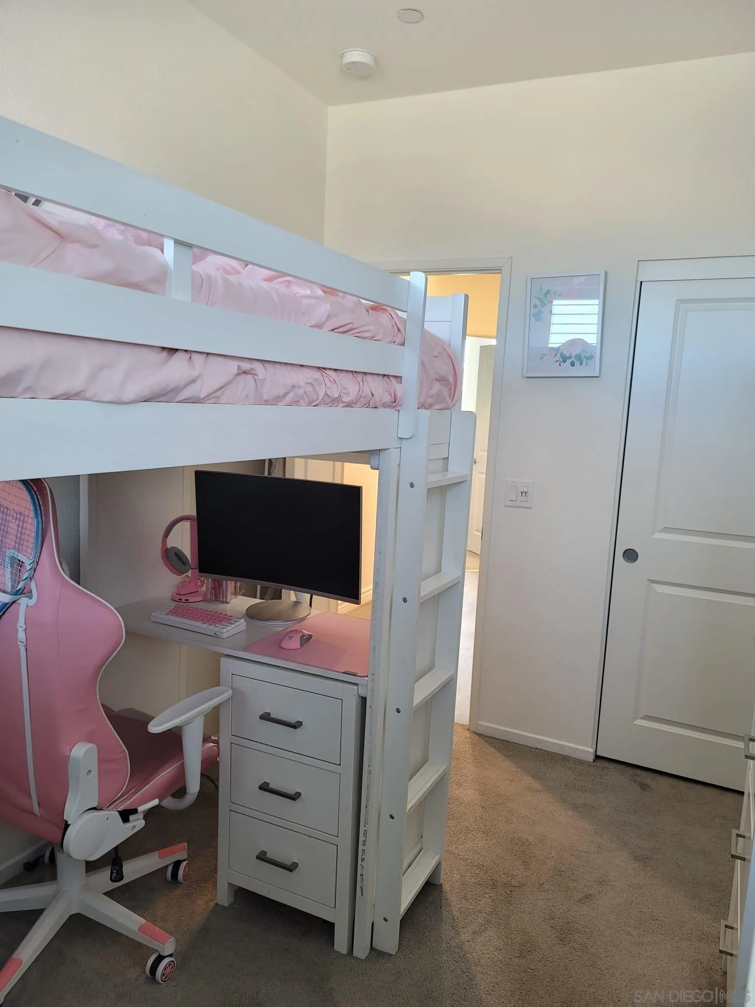 1380 Santa Victoria Road, Unit 2 Chula Vista, CA 91913 - Photo 18 of 27 a room with a dresser and a television