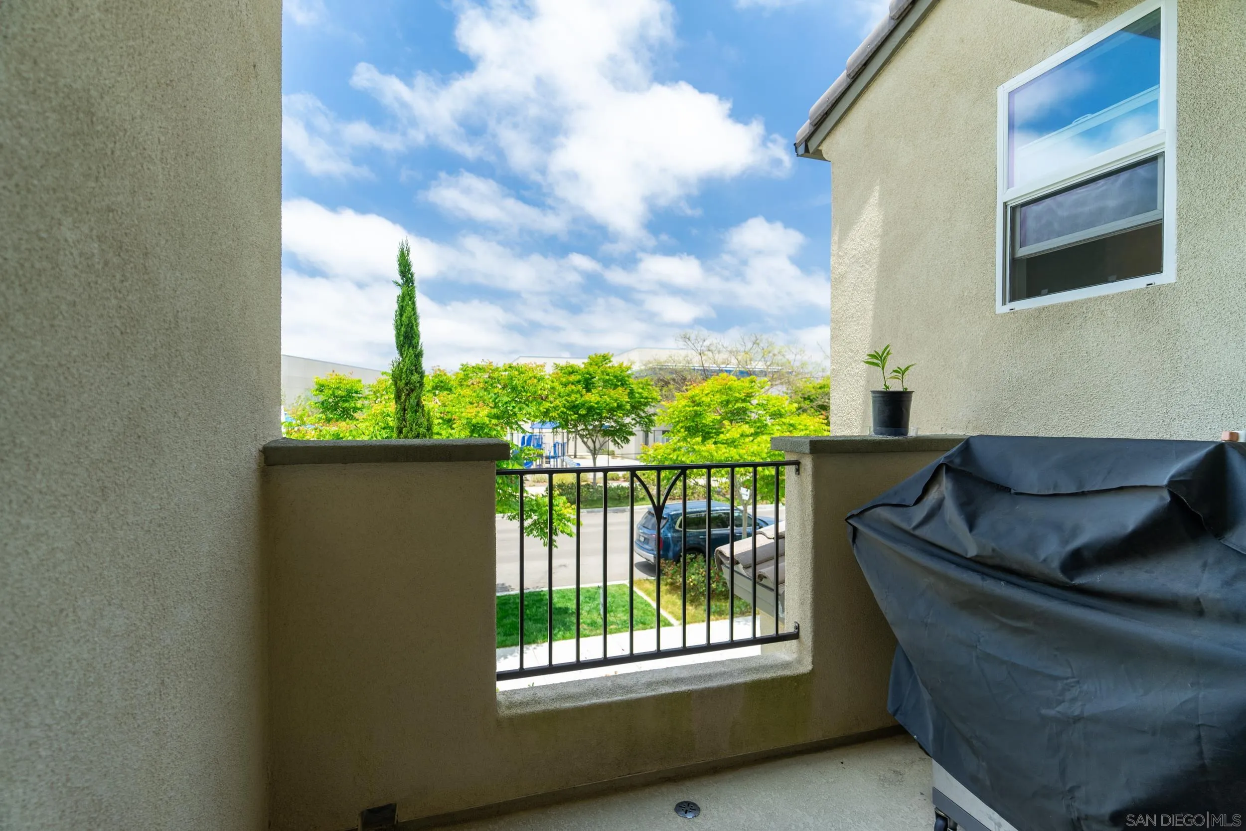 1380 Santa Victoria Road, Unit 2 Chula Vista, CA 91913 - Photo 21 of 27 a living room with furniture and a window