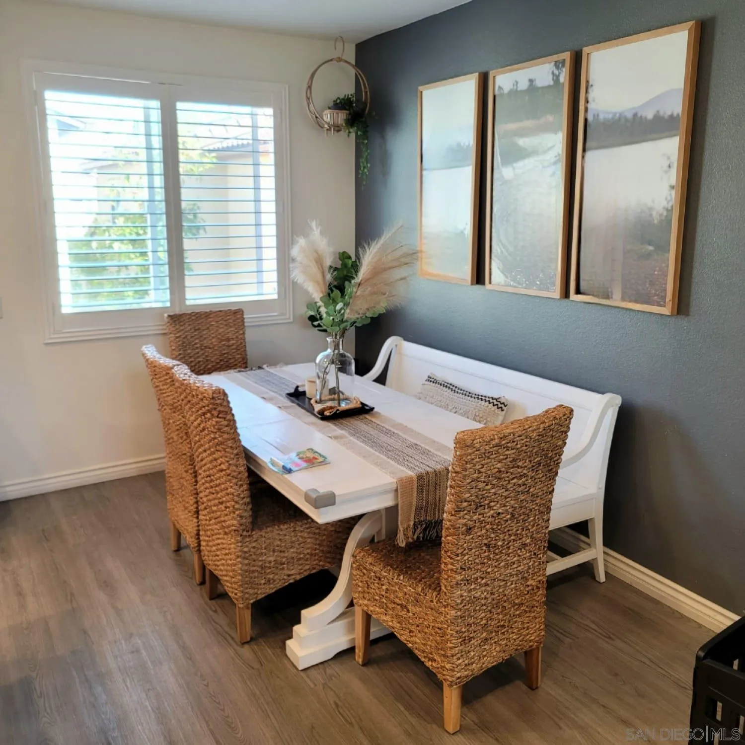 1380 Santa Victoria Road, Unit 2 Chula Vista, CA 91913 - Photo 7 of 27 a dining room with furniture and wooden floor