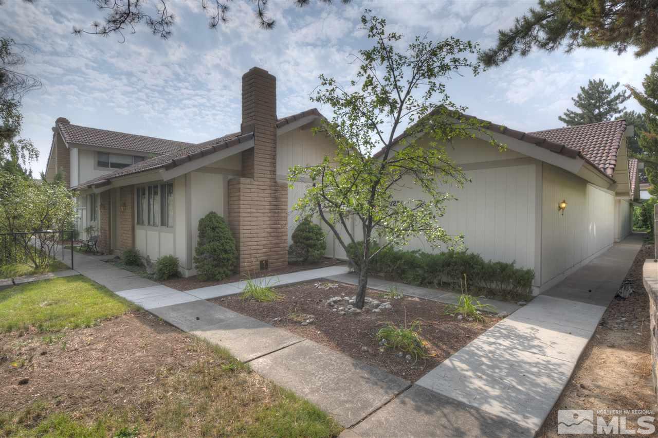 1221 Laredo Court Reno, NV 89503 - Photo 1 of 32 a front view of a house with garden