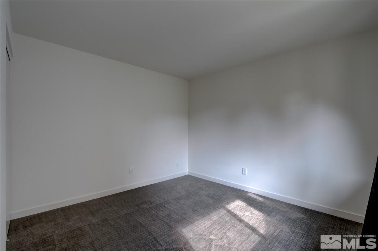 1221 Laredo Court Reno, NV 89503 - Photo 18 of 32 a view of an empty room and window