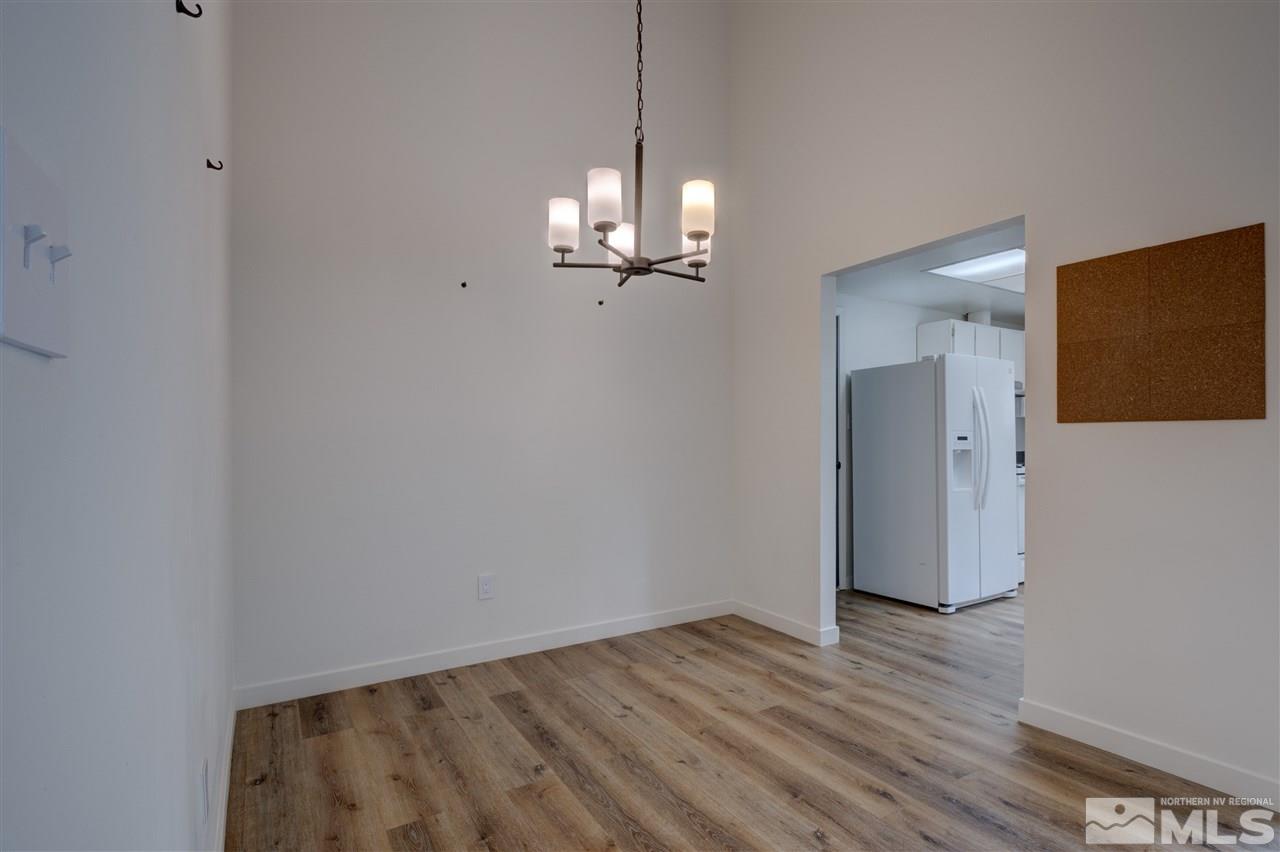1221 Laredo Court Reno, NV 89503 - Photo 8 of 32 a view of a livingroom with wooden floor