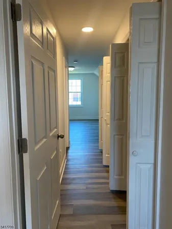 a bathroom with a bathtub and a toilet