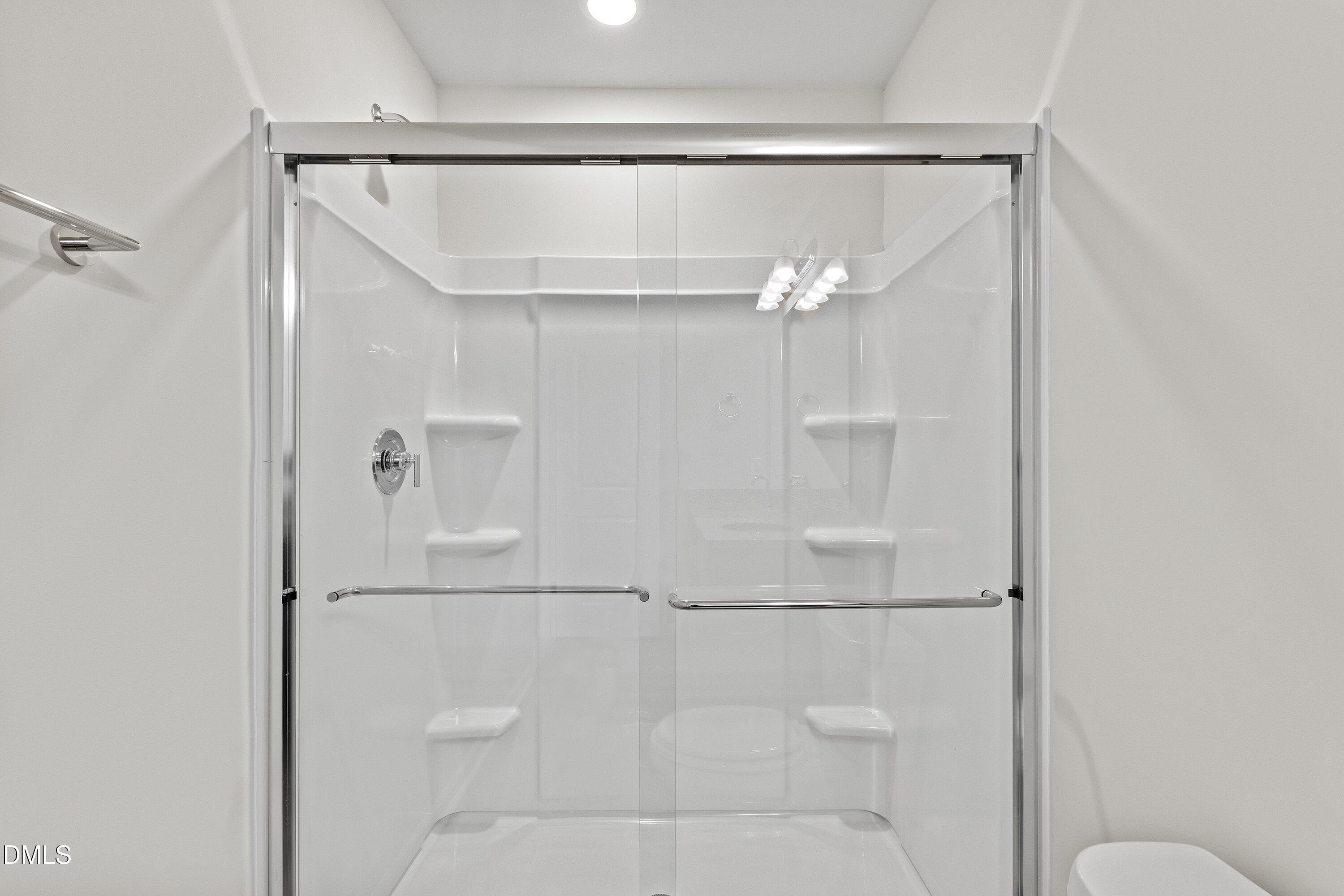 2550 Olive Chapel Road Apex, NC 27502 - Photo 31 of 41 a bathroom with a shower