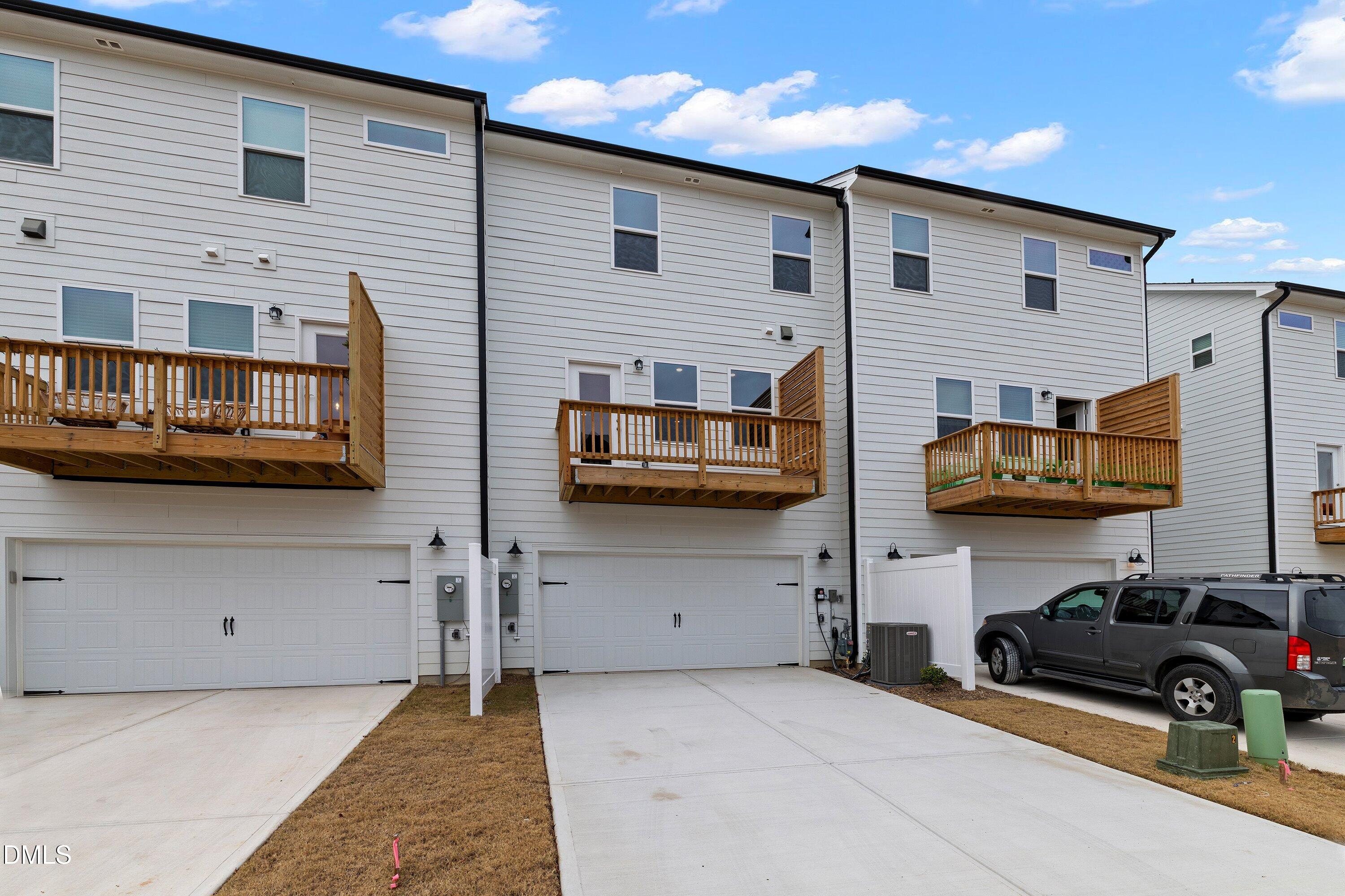 2550 Olive Chapel Road Apex, NC 27502 - Photo 38 of 41 a view of a house with a cars park