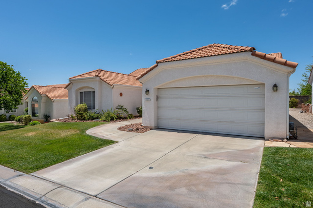 39 North Valley View Drive, Unit 51 St. George, UT 84770 - Photo 2 of 25 Mediterranean-style stucco exterior with a tiled roof