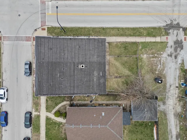 a view of a bathroom with a shower and a sink