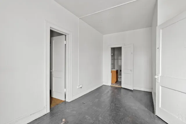 a bathroom with a tub and shower