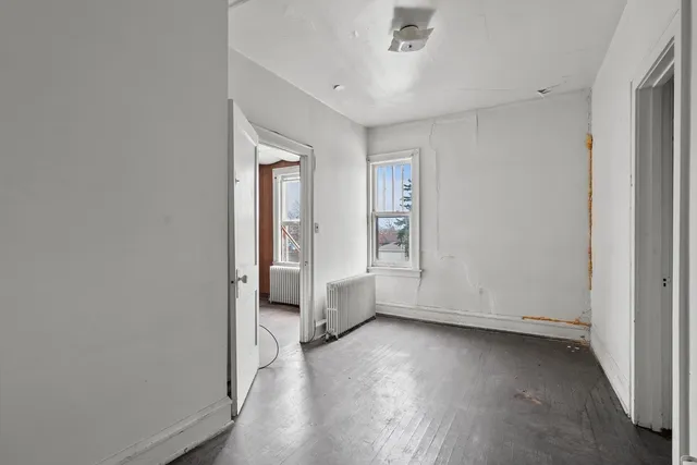 an empty room with cabinet